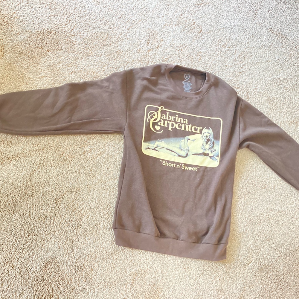 Brand new.  From her concert.  Never worn